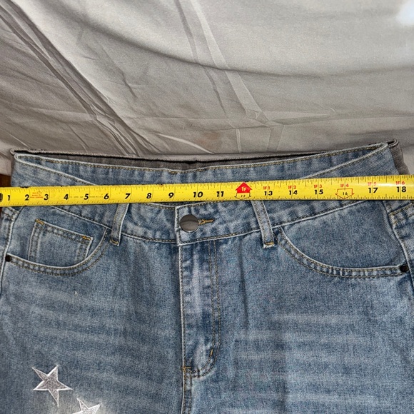 Ripped Jeans with Star Accents - Picture 11 of 16